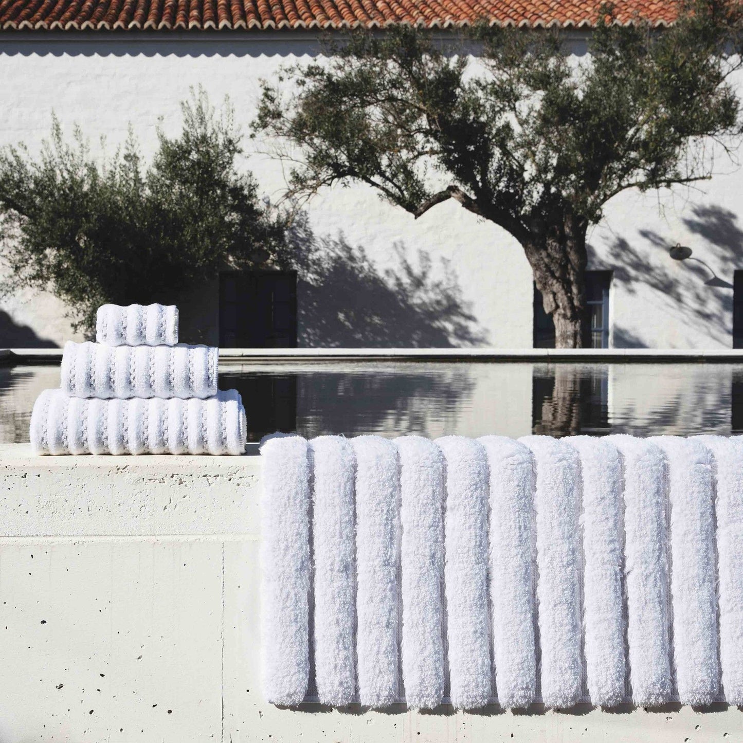
                  
                    PETRA TOWELS
                  
                