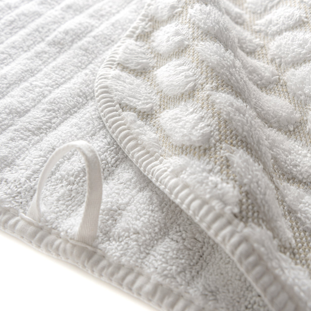 
                  
                    PETALO TOWELS
                  
                